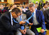 Президент Сбербанка Герман Греф и зампред ЦБ Алексей Улюкаев сравнивают галстуки во время собрания акционеров Сбербанка, май 2013 г.