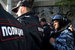 Полицейские в Москве во время акции "Марш мира" против войны на Украине.