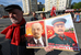 Участник шествия коммунистов в день международной солидарности трудящихся на Большой Якиманке в Москве