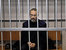 Активист Greenpeace Дмитрий Литвинов, обвиняемый в терроризме и ведении незаконной научно-исследовательской деятельности, перед началом избрания меры пресечения в Ленинском суде города Мурманска.