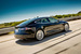 Компании Маска Tesla Motors удалось создать по-настоящему массовый электромобиль (на фото Tesla Model S) и сеть зарядных станций по всей Северной Америке