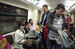 Кандидат в мэры Москвы Алексей Навальный и начальник его предвыборного штаба Леонид Волков раздают агитационную газету Навального в вагоне метро.