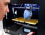 Мануэль Лют представляет 3D-принтер MakerBot Replicator 2 на компьютерной выставке CeBit в Ганновере 5 марта 2013 г.