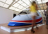 Кабина МС-21
На авиасалоне была выставлена полноразмерная кабина проектируемого самолета МС-21, который по плану производителя – корпорации "Иркут" – должен начать коммерческую эксплуатацию в 2018 г. В ходе 50-го Международного авиасалона «Ле-Бурже» в Париже ОАО «ВЭБ-лизинг» и ОАО «Корпорация «Иркут» заключили соглашение о намерениях по приобретению самолетов МС-21.
Со стороны ОАО «ВЭБ-лизинг» документ подписал генеральный директор Вячеслав Соловьев, со стороны ОАО «Корпорация «Иркут» – президент Олег Демченко.
В соответствии с соглашением "ВЭБ-лизинг" планирует разместить твердый заказ на 30 самолетов семейства МС-21 общей каталожной стоимостью $2,5 млрд.
Твердый контракт планируется подписать в рамках МАКС-2013.