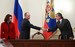 Президент Путин, глава "Роснефти" Игорь Сечин и помощник президента Эльвира Набиуллина.