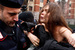 Три активистки Femen разделись на избирательном участке, где голосовал Берлускони