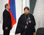Президент России Владимир Путин и наместник Сретенского мужского монастыря Архимандрит Тихон во время церемонии награждения государственными наградами России в Кремле. 2007 г.