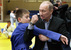 24.01.2012
Владимир Путин с юным дзюдоистом во время посещения Регионального центра дзюдо в здании Спортивного комплекса "Арена" в Кемерово