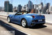 Появление Ferrari California на нашей служебной парковке произвело фурор — такого интереса не вызывали ни Maybach, ни Rolls-Royce Ghost. Но удовлетворить желание всех мечтающих прокатиться (а размеры парковки в принципе позволяют производить стритрейсерские заезды) было не суждено: могучий рев Ferrari California вскоре извлек из офиса на свежий воздух начальника службы безопасности офисного центра, который и прекратил несанкционированные заезды.
А вот на московских улицах Ferrari California, крашенный в неброский серо-голубой цвет (с красным салоном), поначалу не производил впечатления на окружающих. Но это только если двигался в “пешеходном” режиме. Потому что стоило лишь надавить на педаль газа чуть сильнее, как мощный голос мотора и настроенный выхлоп моментально делали Ferrari California самым ярким участником дорожного движения. Ведь California, даром что автомобиль переднемоторный и восьмицилиндровый (некоторые снобы признают только двенадцатицилиндровые или заднемоторные Ferrari), — полноправный родственник своих старших братьев из Маранелло: мощность — “гроссмейстерские” свыше 100 л. с. на литр рабочего объема двигателя, ускорение до 100 км/ч — быстрее 4 секунд, “максималка” — более 310 км/ч. При этом Ferrari California — кабриолет с посадочной формулой 2 + 2 и жесткой крышей — автомобиль универсальный. Даже для Москвы. Он не требует специальной подготовки — кроме знания того факта, что на Ferrari после нажатия кнопки Engine Start надо потянуть на себя правый подрулевой переключатель, тогда великолепная коробка California с двумя сцеплениями переключится из нейтрали на первую передачу. А дальше можно рулить по желанию: в ручном режиме, оперируя подрулевыми лепестками, или в автоматическом. Но даже в автоматическом режиме коробка не торопится переключаться вверх: если водитель ускорился и включилась пониженная передача, то АКПП держит ее продолжительное время, сохраняя обороты двигателя у предельной отметки. И лишь затем, если водитель не предпринимает новых ускорений, коробка переключается вверх — чтобы экономить топливо.