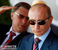 Премьер Владимир Путин и вице-премьер Сергей Иванов на трибуне "МАКСа". Владимир Путин и главком ВВС России Александр Зелин наблюдают за полетами.