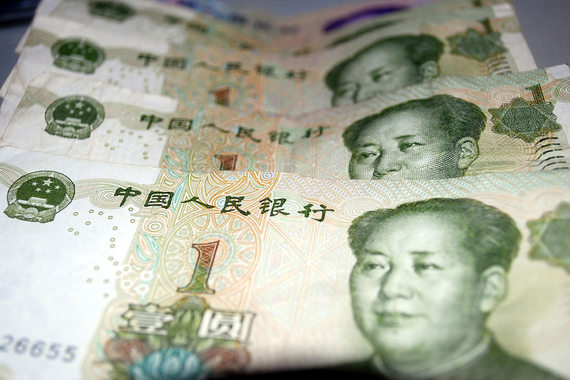 Народный банк Китая (НБК) девальвировал курс юаня на 1,9%