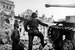 21 апреля 1945 г. войска Красной армии ворвались на окраины Берлина. После ожесточенных боев на улицах города немецкий гарнизон и фольксштурм (ополчение) были разделены на несколько изолированных частей. 1 мая над рейхстагом было поднято знамя Победы, 2 мая остатки гарнизона капитулировали. Берлин был полностью занят советскими войсками