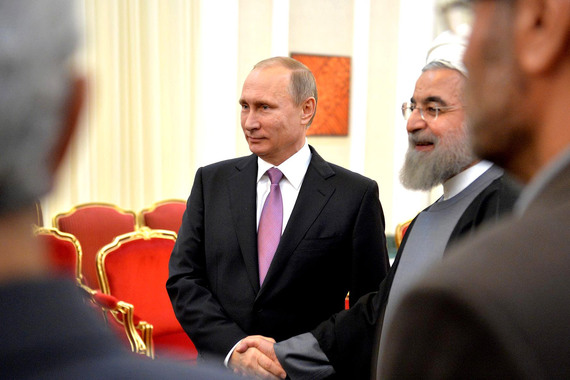 Президент России Владимир Путин и президент Ирана Хасан Рухани перед началом российско-иранских переговоров