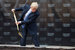 Дональд Трамп закладывает первый камень у здания будущего отеля в июле 2014 г.