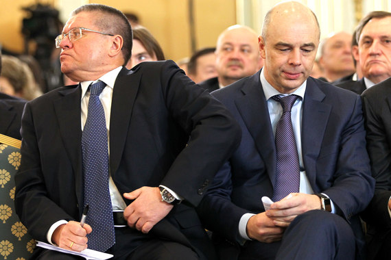 Министру экономического развития Алексею Улюкаеву (на фото слева) придется подстроиться под министра финансов Антона Силуанова