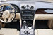Из салона Bentayga исчезла симметричная передняя панель, отсылающая к крылатому логотипу Bentley