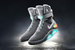 22 октября 2015 г. Nike представила самозашнуровывающиеся кроссовки Nike Mag, которые были созданы по образцу футуристической обуви из фильма «Назад в будущее». Президент и гендиректор Nike Марк Паркер отметил, что сначала компания стала придумывать нечто для вымышленной истории, но затем решила воплотить это в реальность и изобрела «технологию, которой смогут воспользоваться все спортсмены»