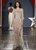 Jenny Packham - английская марка, ее часто выбирает для вечерних выходов жена принца Уильяма герцогиня Кембриджская. Одна из ее любимых моделей - с вырезом лодочкой и длинными рукавами