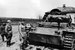 Поврежденный и захваченный советскими войсками немецкий танк Pz-III. Середина мая 1942 г.