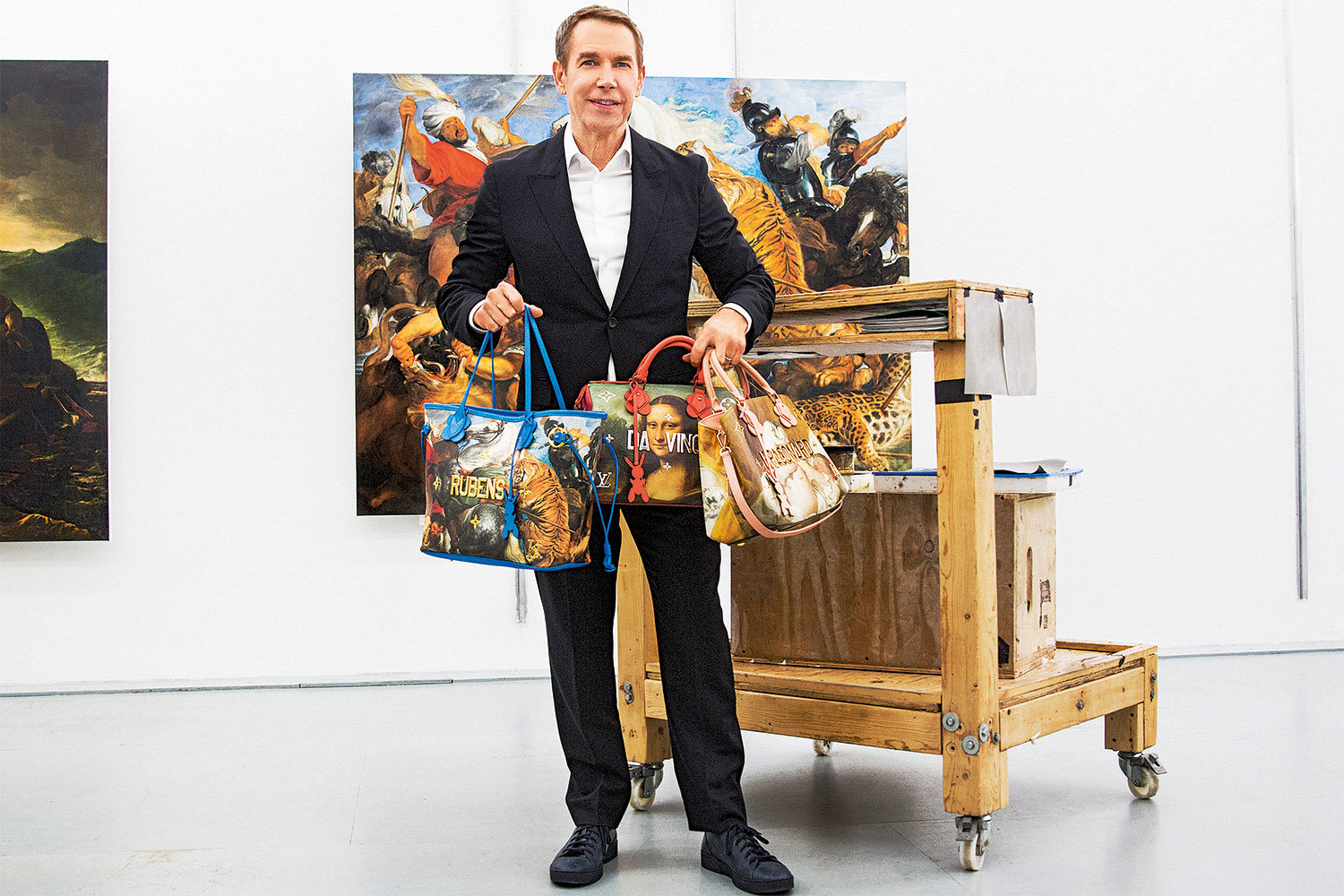 Художник Джефф Кунс с сумками Louis Vuitton из коллекции Masters