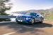Bentley представила новый Continental GT – купе класса Gran Turismo. Профиль Continental GT вытянулся и стал более приземистым из-за смещения передних колес на 135 мм вперед, что позволило удлинить капот и занизить переднюю часть автомобиля