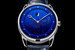 De Bethune представляет часы на популярную «звездную» тему - модель DB25L Milky Way с изображением Млечного Пути и сферическим индикатором фазы Луны. Регулировка функций осуществляется с помощью заводной головки, которую можно установить в три положения: для перевода стрелок, установки сферического указателя фазы Луны и ручного подзавода