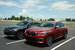 Хорошо видна разница американской (темно-серая Xdrive 30i) и европейской (красная M40d) версий X4