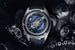 В модели Freak Vision, Ulysse Nardin использованы два новых усложнения. Первая из них – балансовое колесо из сверхлегкого кремния со стабилизирующими лопастями, выполненными из сплава никеля, создающими стабилизирующие турбулентные потоки. Вторая – сапфировое стекло прямоугольной формы, благодаря чему появился обновленный, более тонкий корпус. Стоимость модели - 95 000 франков