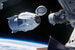 Crew Dragon представляет собой усовершенствованную пилотируемую версию многоразового аппарата Dragon, которая позволит экипажу добираться до МКС и возвращаться на Землю. В отличие от грузового корабля Dragon, он будет стыковаться с МКС самостоятельно, без использования манипулятора станции. На фото: иллюстрация стыковки с МКС
