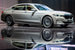 BMW обновила внешность представительских седанов 7 серии. Чтобы разместить зубастую решетку радиатора в новом фирменном стиле переднюю кромку капота пришлось приподнять на 50 мм