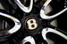 Все автомобили, произведенные в юбилейном для Bentley 2019 году, получают колеса с логотипом в золотой окантовке