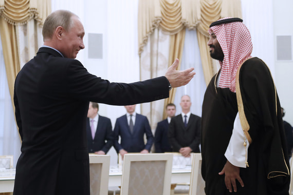 На футболе, в Кремле и Аргентине. Фотографии встреч Путина и принца Саудовской Аравии