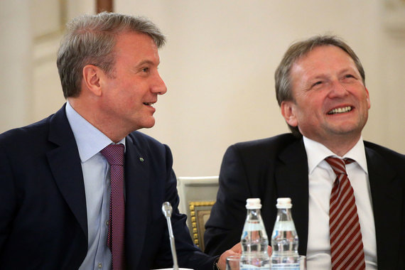 Борис Титов (справа) предложил предправления Сбербанка Герману Грефу (слева) подключиться к работе