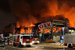 Пожар в ТЦ «Мега Химки» в Подмосковье 9 декабря охватил площадь до 18 000 кв. м, огонь распространился по всей площади здания. Кровля ТЦ обрушилась после серии взрывов.