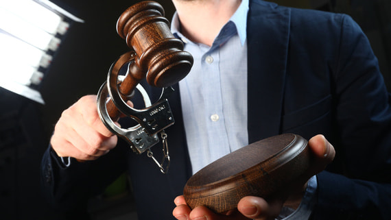 Суд заочно приговорил американского наемника к 28 годам заключения