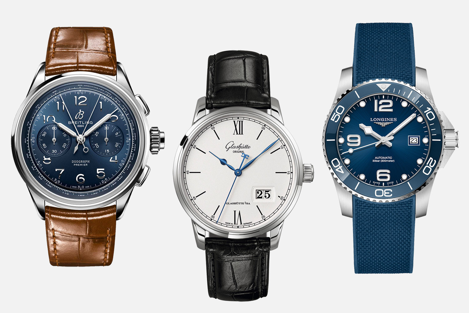 Слева направо: хронограф Breitling Premier B15 Duograph 42, классический трехстрелочник с большой датой Glashutte Senator на кожаном ремешке, дайверские часы Longines с вращающимся безелем на каучуке